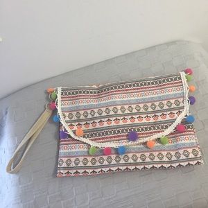 Greek handmade embroidered pompom clutch
